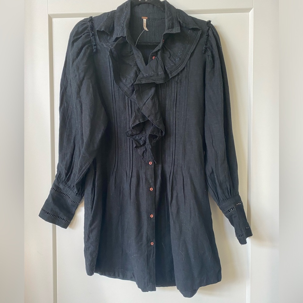 NWOT Free People black shirt dress with ruffles.